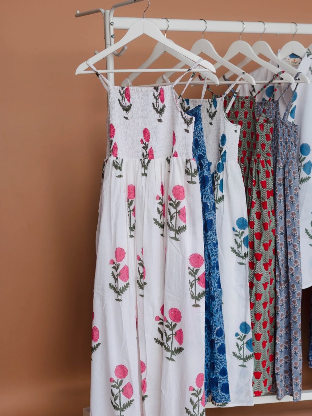 White Maxi Dress with Pink Floral Print and Smocked Bodice